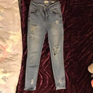 Skinny light blue ripped jeans